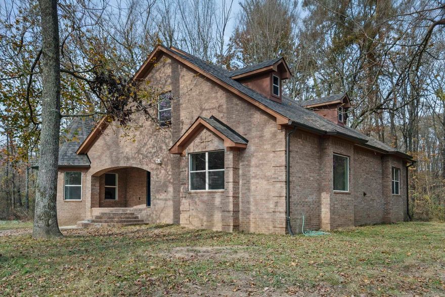 Welcome to the space buy of the decade! This incredible 4 bedroom, 3 bath home offers 3,983 sq ft of spacious living on 3.46 beautiful acres, all outside the city limits for added privacy and freedom. The property even includes its own peaceful pond with adorable resident ducks. Inside, you will find three oversized primary suites, each featuring a full bathroom and walk in closet. This is a rare and valuable layout ideal for multigenerational living, extended guests or even ABNB! The home is filled with unique charm, crown molding, and thoughtful upgrades throughout. The kitchen is designed for those who love to cook, offering granite countertops, a double oven, ample cabinetry, and a huge walk in pantry. Storage is unmatched in this home, with abundant built ins plus a 30×30 shop perfect for hobbies, equipment or extra parking. Relax and unwind on the nice back deck overlooking your acreage. Major improvements include a new roof in 2025. Flood insurance is required, see AGENT REMARKS and DOCUMENTS.