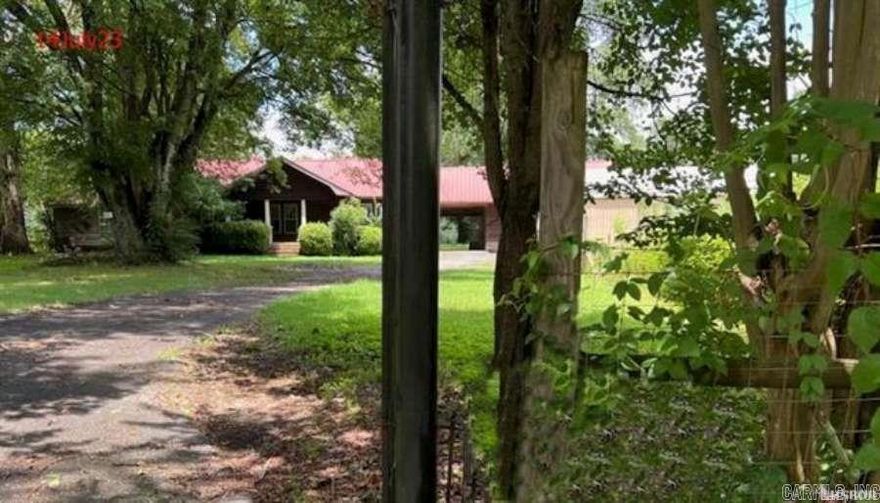 GLEN ROSE.. REDUCED - 1.5 acres with 2076 sf home $134,900!!! traditional ranch partially fenced, carport, separate DR and wood burning stove; metal roof, stg building and/or workshop with electricity; 2 full baths and potential for 4 BRs, public water & septic; sold AS-IS!!