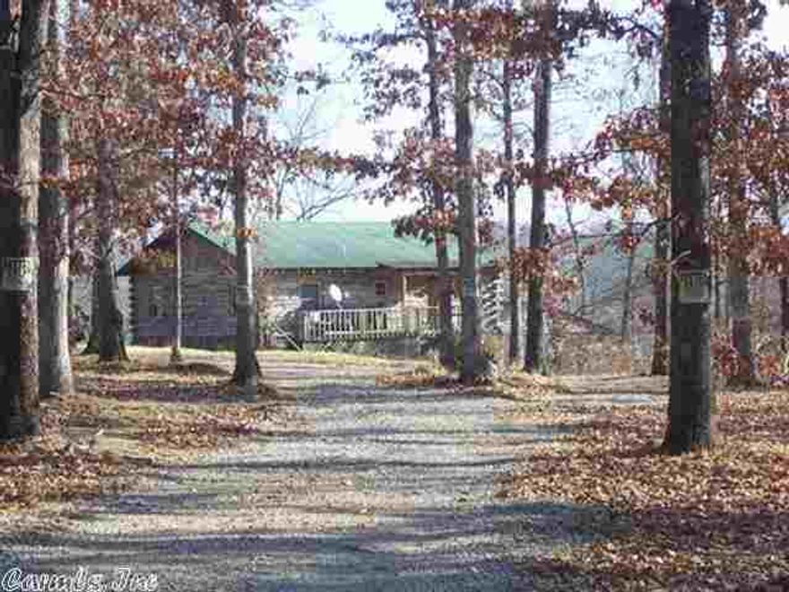 3 bedroom one bath with a partial basement for a total of 1285 square feet. The interior of the home is a mixture of cedar and drywall with prefinished oak flooring, oak kitchen cabinets, and authentic Ironwork light fixtures. Propane range, refrigerator, microwave, dishwasher and disposal will all remain, as well as a 250 gallon propane tank. The home is heated by a propane fireplace and ventless heaters.