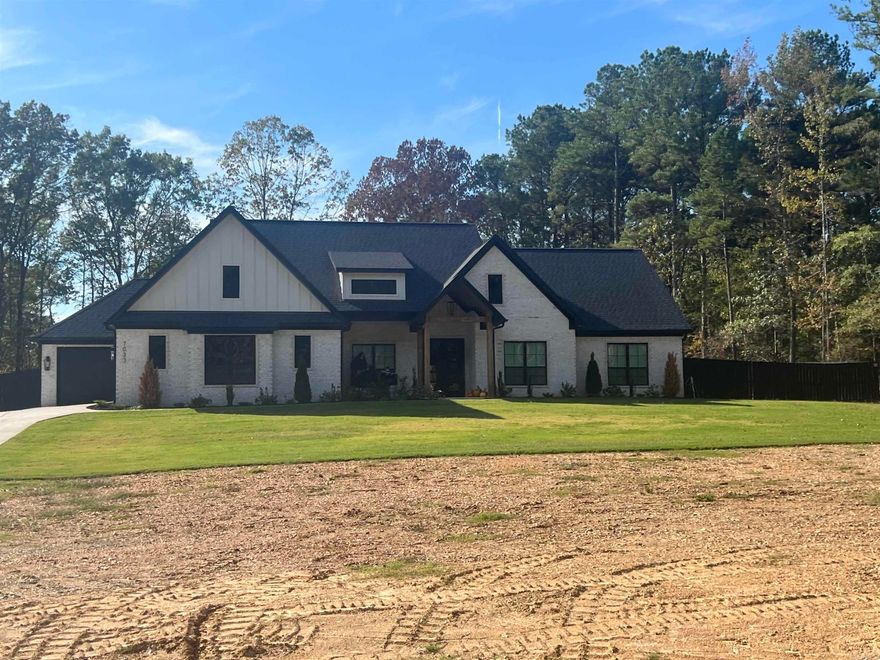 Beautiful home on nice acreage and a pool