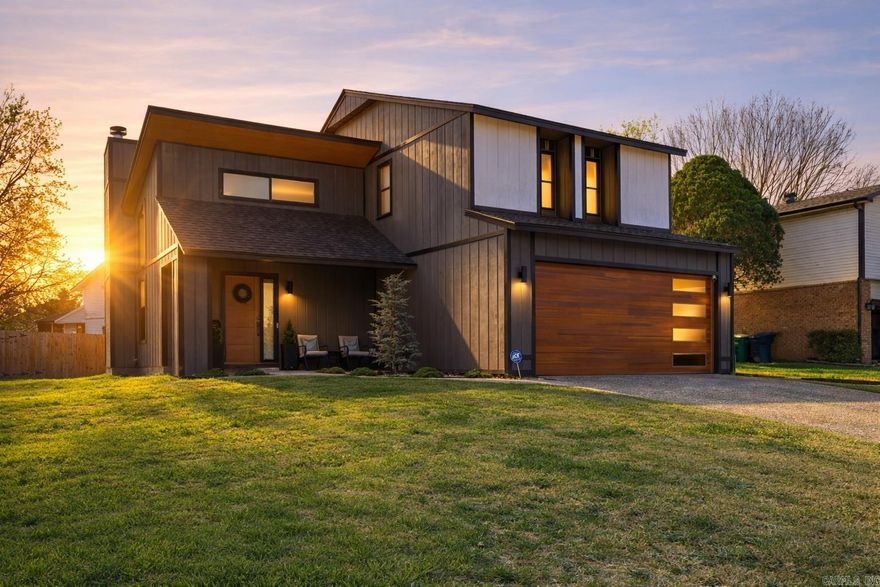 Light-filled and thoughtfully updated, this contemporary West Little Rock home blends modern design with everyday livability. Soaring ceilings and expansive windows fill the main living space with natural light, creating an open and inviting atmosphere. The updated kitchen features sleek cabinetry, quartz countertops, stainless appliances, and a spacious dining area perfect for gathering. Designer finishes and curated details continue throughout the home, including updated lighting, modern flooring, and stylish bathrooms. The primary suite offers a spa-inspired bathroom with oversized tile and contemporary fixtures, while two additional bedrooms provide flexible space for guests, office, or hobbies. Recent upgrades include HVAC, roof, windows, and flooring, giving buyers peace of mind along with great style. Outside, enjoy a spacious fully fenced backyard ideal for relaxing, entertaining, or pets. Located in a desirable West Little Rock neighborhood just a short walk to community pool and tennis courts, this home delivers modern comfort, great light, and standout design in one move-in-ready package. Agents, see remakrs for full list of upgrades.