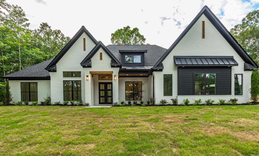 Situated on a 2.20 acres lot, this exquisite home is perfect. From the carefully manicured grounds of Hazel Oak subdivision  spectacular  views, this home will be truly picturesque! Thoughtfully designed w/entertainment in mind this residence boasts both formal & casual living. . Inside you’ll find updated on-point designer fixtures and finishes, hardwood flooring, cathedral ceilings,  This peaceful escape offers 5 bedrooms, 4 full baths, dining room and 32 foot wide patio with wood burning fireplace. The gourmet kitchen is the crème-de-la-crème of style and function, Custom pantry, spacious island and eat in a dinette overlooking the Family room ..Custom built cabinets, Quartz countertop throughout the home, gas stove, breathtaking Accent walls, every door in the home is 8 foot tall, Tank-less Hot-water heater, electric outlets along the lining of the roof, every outer wall has sprayed form insulation.  Sprinkler System for the lawn, don't worry there's plenty of room for your dream backyard. 3036 sqft Home.