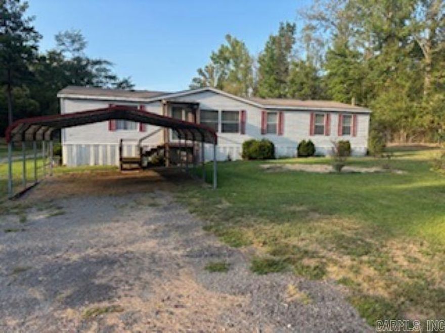This 3 bedroom, 2 full bath home sits on 5 acres in a quiet neighborhood. The Property also includes an extra septic system, water and power hookups perfect for adding a guest house or future expansion, also has a storm shelter for peace of mind during severe weather. Enjoy country living with the convenience of modern utilities and room to grow. agents see remarks