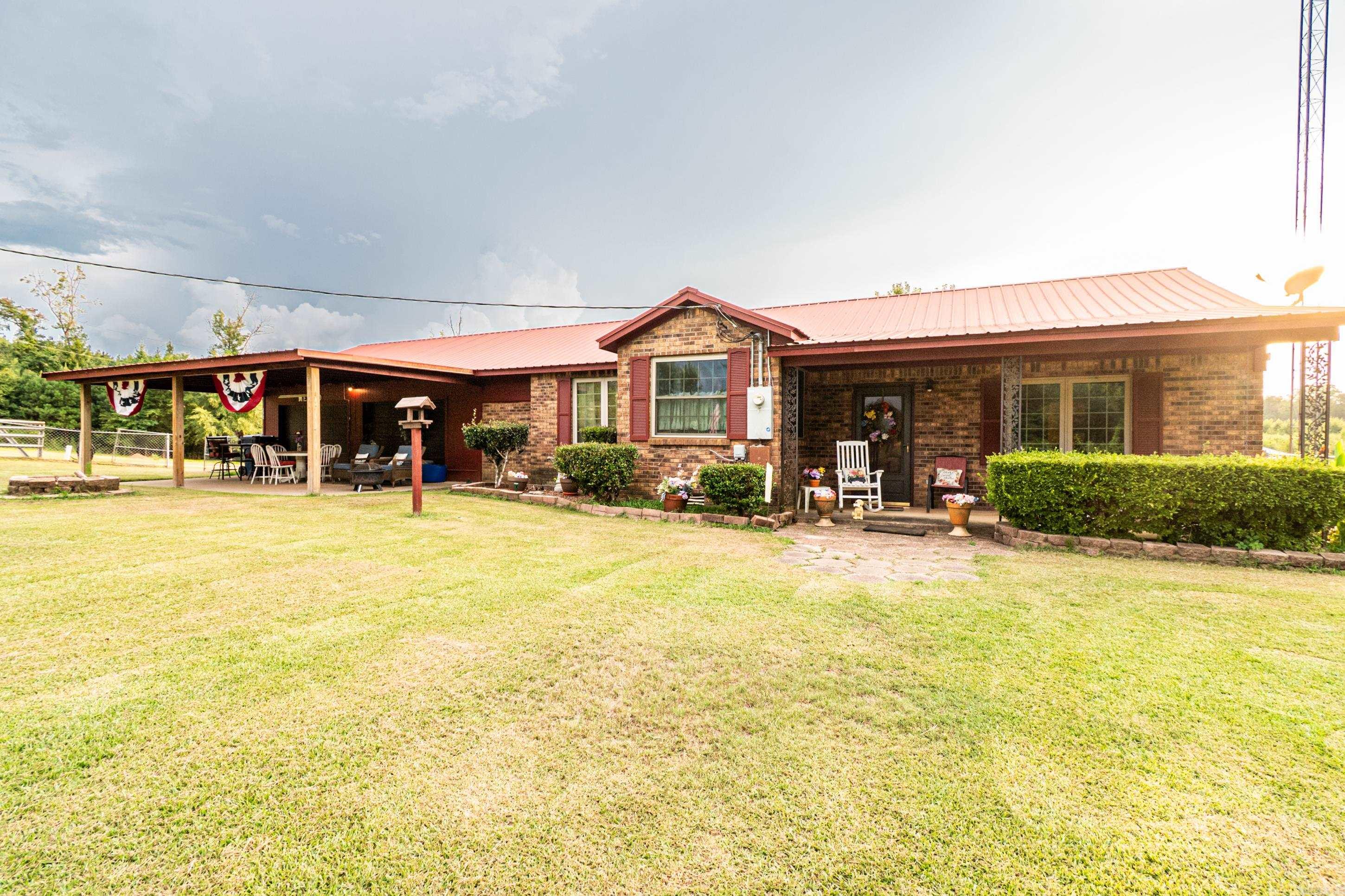 292 Hall Pratt Road ⢠Junction City, AR Nestled on 10 beautiful acres, this charming 3 bedroom, 2 bath home offers the perfect mix of comfort and country living. The majority of the land is cleared, giving you plenty of space for animals, a garden, or simply enjoying wide open views. Inside, the kitchen shines with granite countertops, updated flooring, and fresh paint throughout, making it move-in ready. A metal roof was installed approximately 10 years ago, offering both durability and peace of mind. Please note: the storage building will be removed prior to closing, and mineral rights do not convey. This property is a rare findādonāt miss your chance to enjoy country living just minutes from town! **must have bank pre-approval or proof of funds to view this property.