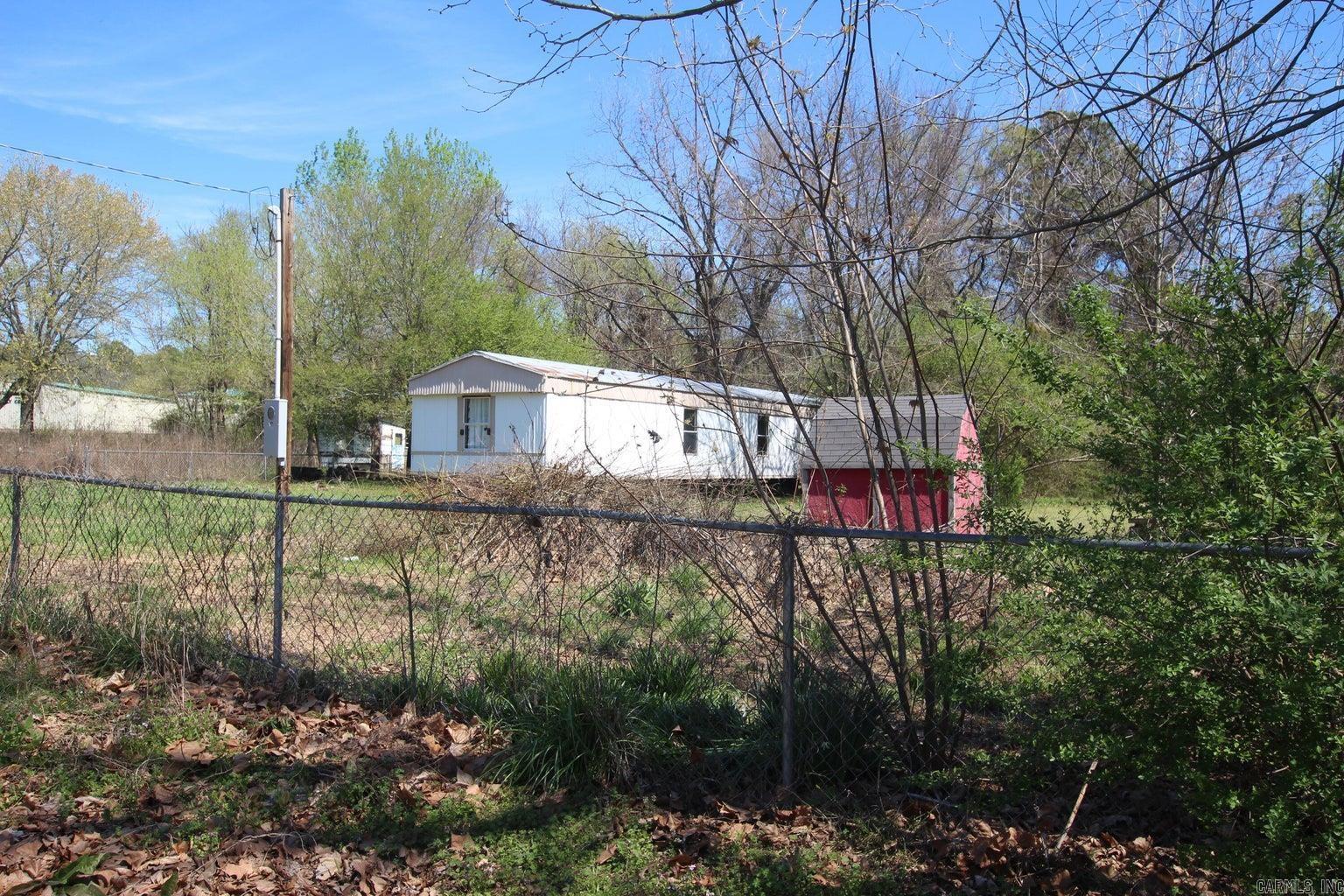 Looking for a fixer upper to flip? This would be a good selection! Mainly some flooring from moving and water damage. Very nice three bedroom 2 bath. Beautiful Ceiling in the living room with attached open kitchen. The bathroom are great! The kitchen just needs a drawer fix or two. Remember we have a HVAC unit waiting for the right buyer. Give us a shot and make this you new project.