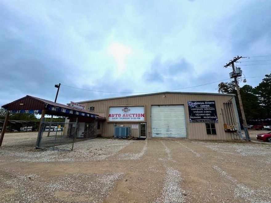 Commercial/Industrial Property on 6.5+/- Acres- Over 18,000 Sq Ft!  Discover endless potential with this expansive 18,00+ sq ft commercial/industrial facility set on 6.5+/- fenced acres. Bult for heavy-duty use this property features thick concrete floors, multiple shipping and loading docks, and a large, detached shop. It offers exceptional functionality for manufacturing, warehousing, or distribution operations. Inside, the building includes spacious office areas, both upstairs and downstairs, a fully- equipped commercial kitchen, and three bathrooms. Outside you'll find a massive gravel parking lot, covered canopy area for loading or equipment storage, and secure perimeter fencing for peace of mind. With room to expand and infrastructure ready for high- demand operations, this property is a rare find for investors and business owners alike. Call today for more information or to schedule a showing!