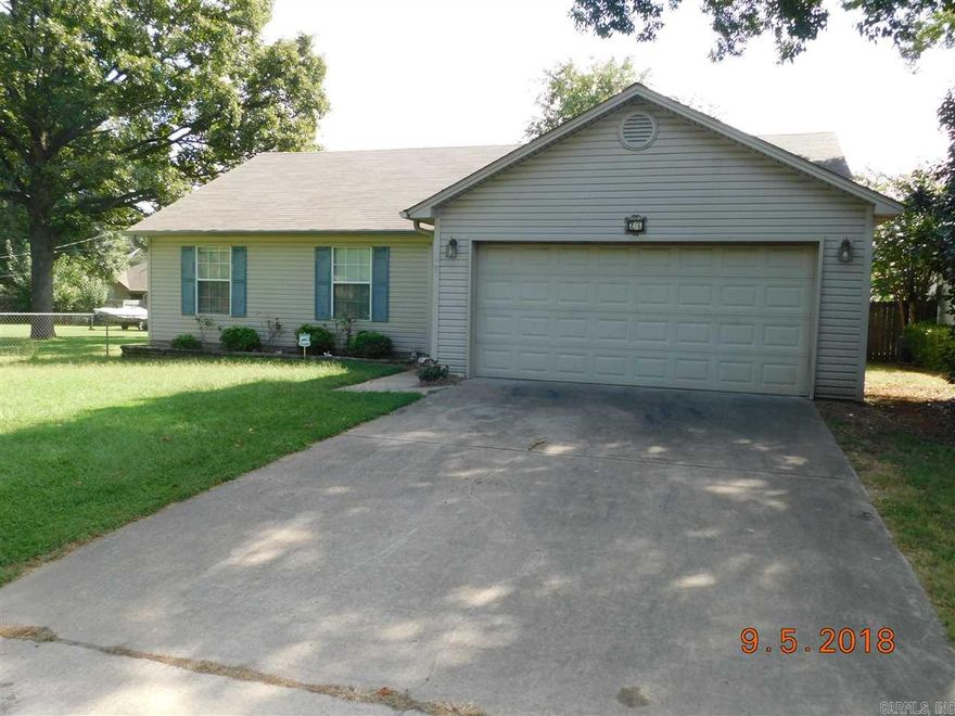 Super nice 3 bedroom, 2 bath home in Sherwood. Laminate floors in common areas & master bedroom which includes on suite bathroom with large lighted closets. Open concept in living, dining & kitchen areas. Kitchen is nicely furnished, gas stove, plenty of cabinet space, pantry, W/D off kitchen & garage entry. This home has HVAC, security system, ceiling fans, window coverings, 2 car garage, large deck, patio, fenced yard & 8' x 10' outside storage. Call Marshall Peters & Associates TODAY! 501-414-8340