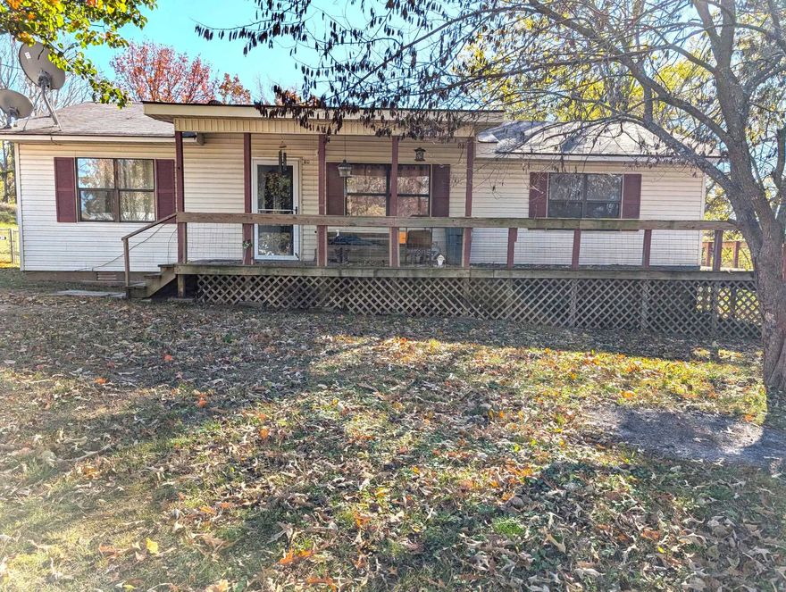 If you are looking for a country home on a hill we have your home. This 3 bedroom, 2 bath is waiting on you! It has newer updates, flooring and updated baths. The backyard is fenced, and has a storage building. It's a lovely home in the country, but not far from town. Check out this house on a hill, on almost an acre of land.