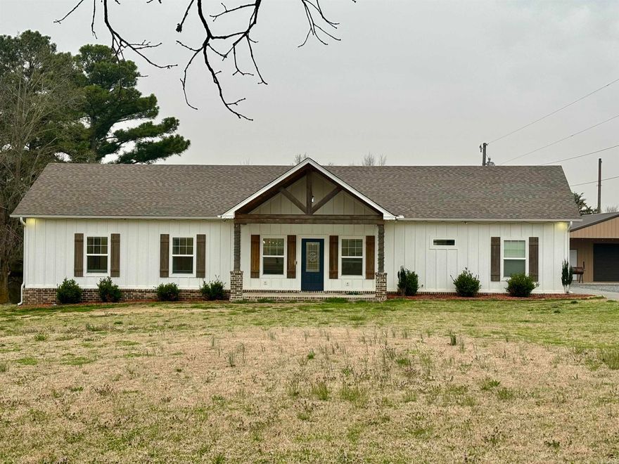 Country living at it's finest.  This beautiful open concept home with 3 br/2ba is waiting for you.  Great layout for entertaining during the holidays. Tons of counter space to spread those big holiday meals. Plenty of land for the kids to play. Back deck to add all of those grills for the griller in your life.  The heated/cooled shop will make a great man cave with plenty of space for all the toys. The paved driveway is just an added bonus.  Far enough from town to have peace and quiet, yet close enough to make a quick run to the grocery store.  Just enough land to stretch out on, but not so much that you spend your weekends off mowing. You will not want to miss seeing this custom built home.  Call me today to see this one.