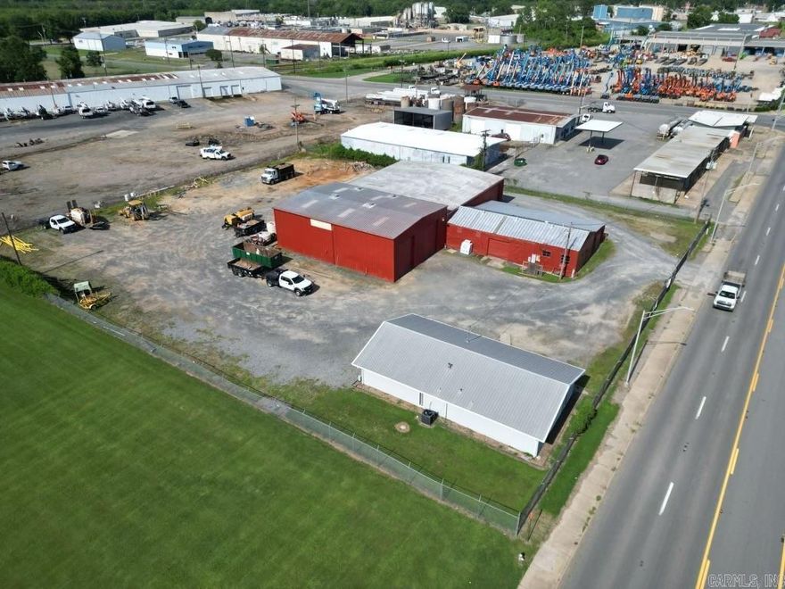 Now available for lease, this versatile industrial property at 3419 E Broadway offers a strategic location within North Little Rock’s heavy commercial zone. The ±11,400 SF facility includes a ±1,680 SF dedicated office building and a ±9,720 SF warehouse, providing an ideal setup for service contractors, logistics operators, or industrial users. The site features a fully fenced yard, eight drive-in overhead doors, and ample space for vehicle or equipment storage. Positioned along a high-traffic commercial corridor with approximately 14,000 vehicles per day, the property offers excellent visibility and direct access to I-30, I-40, and other key transportation routes. With a C-4 zoning designation and room for laydown or fleet operations, this location is well-equipped to support a wide range of commercial-industrial uses.