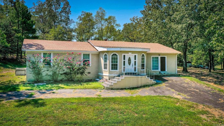 Set on nearly 2 acres in the Lake Hamilton School District, this 4 bedroom, 3 bath home offers the space and flexibility today’s buyers are looking for. With 2,476 square feet, the layout includes multiple living areas, a generous bonus room, and plenty of natural light throughout. The kitchen and dining flow easily into the main living space, making it ideal for gatherings both large and small. Each bedroom is designed for comfort, while three full baths provide convenience for a growing family or overnight guests. Outside, the expansive lot gives you the freedom to create your own retreat—whether it’s a garden, play area, or simply a quiet place to enjoy nature. Located just minutes from town, this property delivers the best of both worlds: privacy and room to spread out with quick access to shopping, dining, and schools.