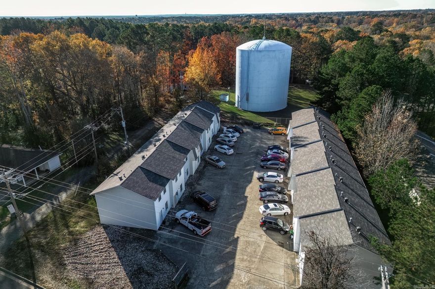 Welcome to the heart of Arkadelphia where modern comfort meets historic charm in this meticulously remodeled 27-unit apartment complex. Nestled within a vibrant community, this property boasts an ideal blend of convenience and tranquility. Each unit offers spacious living with two bedrooms and one and a half baths, providing ample room for residents to relax and unwind. With a recent renovation, the apartments feature contemporary finishes and upgraded amenities, ensuring a comfortable and stylish living experience. Currently enjoying a commendable 90% occupancy rate, this complex presents a lucrative investment opportunity with steady rental income. Furthermore, the expansive lot affords room for potential expansion, allowing investors to capitalize on the growing demand for residential space in this desirable area. Don't miss your chance to own a piece of Arkadelphia's burgeoning real estate market with this exceptional property.