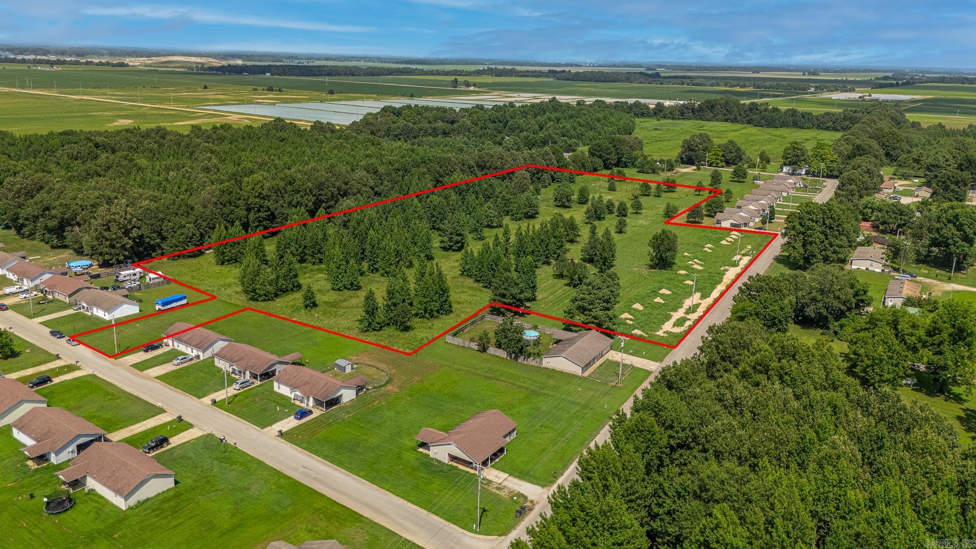 This parcel spans nearly 11 acres and is primed for development. Eight lots are already prepped with water, electric, and sewer, allowing builders to break ground immediately. Approved for a 44-lot single-family subdivision, this property offers a flexible layout that can easily be redesigned to fit a builder's unique vision. Whether you're ready to follow the existing plan or tailor it to your needs, this is a rare opportunity to capitalize on a fast-moving market with a project that's already ahead of schedule.
