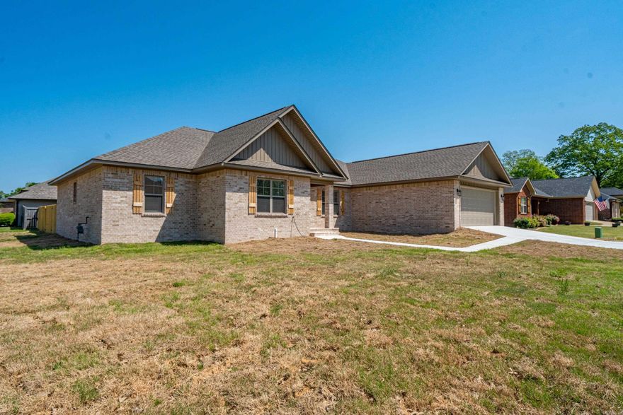 Brand New, ready to Move in.  Just completed Brick home on corner lot with fenced back yard back patio area.  Home features 4 bedrooms, 2.5 baths, split floor plan with dining, breakfast area.  Fireplace in the living room, granite counter tops, tile and vinyl plank flooring, tankless water heater.  Call Today to see one of the few New Construction homes offered in the area.
