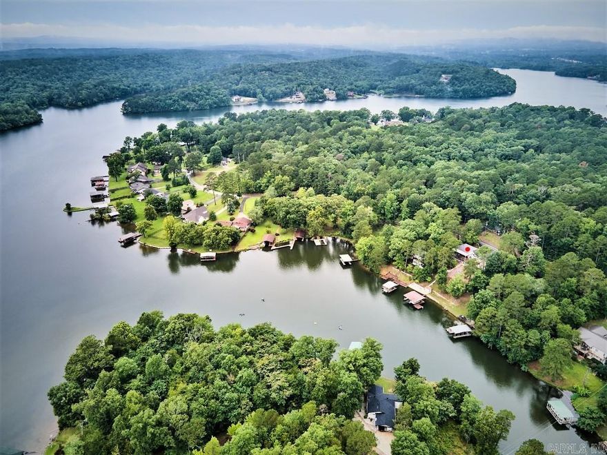 Welcome to 427 Kirschwood Drive!  First time on the market!  This home has so many features they cannot all be listed here; which makes this a MUST SEE!  This is a solid, custom built, one-owner home that sits on 0.53 acres with 129.5 feet of lake frontage, 4,011 +/- sq. ft. with 5 Bedrooms and 3 Bathrooms, a game room, safe/storm shelter, two fireplaces, two living areas, a screened porch, custom fire pit, gazebo, double boat dock with lifts and a swim dock.  Many items convey in this home and several items are for sale.  We have provided a detailed information sheet in the home for you to utilize as you tour this unique property.  Sellers request a 24-hour notice so give me a call today to schedule your tour.