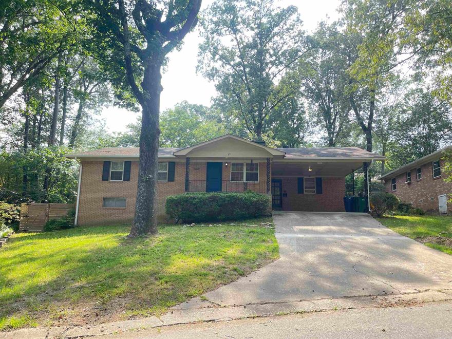 Wonderful updated home in the Story Brook Subdivision! New gorgeous granite in the kitchen, stainless steel appliances, fresh paint and new wood flooring. Spacious laundry room with tons of storage and new tile flooring. Massive fireplace in the dining room, great for cold winters and cozy dinners. New carpet and paint throughout the house. Plus a downstairs bonus room that could be a 4th bedroom, man cave or den! It has access to a 2nd patio. This is a great house with lots of updates.