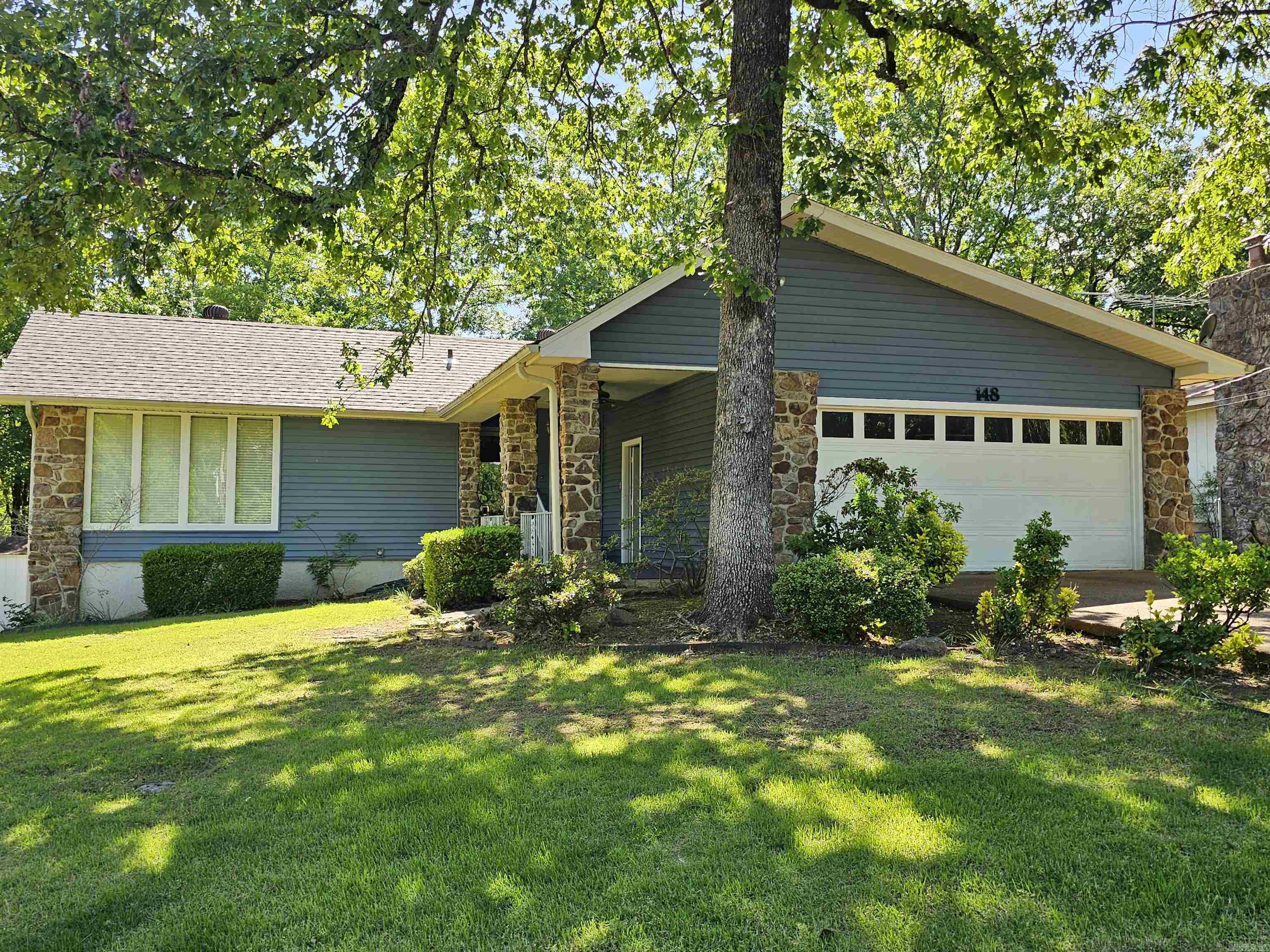 Welcome to your dream home! This beautiful 3-bedroom, 2-bathroom residence is nestled in a peaceful neighborhood located just minutes from the stunning Greers Ferry Lake—perfect for boating, fishing, and outdoor adventures. This turn-key home boasts spacious living areas, a well appointed kitchen, and a cozy master suite with a private bath. Enjoy natural light-filled rooms, a large backyard perfect for entertaining, a dedicated laundry room for convenience, and a two-car garage for added storage and ease. The home is being sold fully furnished, so all you need to do is bring yourself! Located near local amenities, parks, and shopping, this home is ideal for families or anyone looking for a serene retreat. Don't miss out on this incredible opportunity—schedule your showing today!
