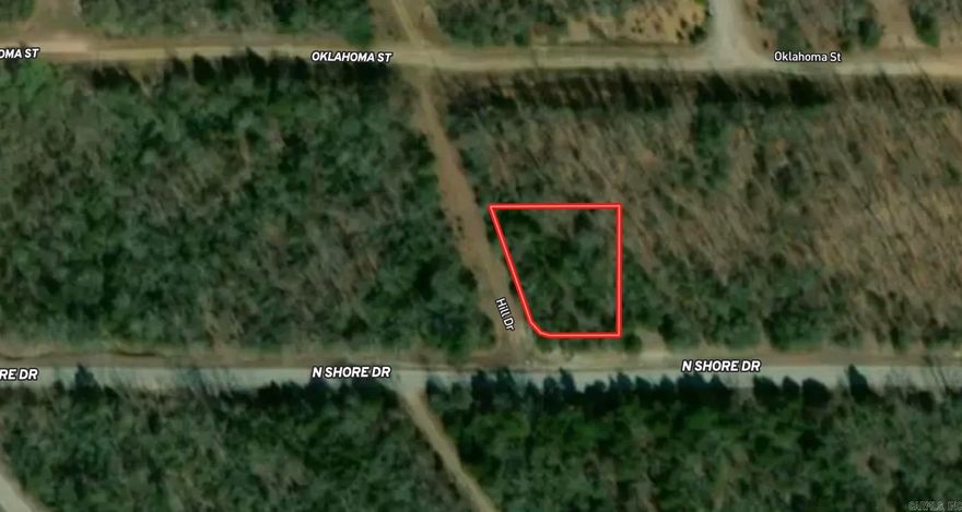 Discover the potential of this beautiful wooded vacant lot located in a quiet area. This property offers a natural setting filled with mature trees, making it an excellent opportunity for those seeking privacy and a peaceful environment.  With no utilities currently on the property, this lot provides a blank canvas for your future plans—whether you're looking to build a custom home, create a private getaway, or invest in land for the future. The restrictions in place help protect the surrounding area and maintain property values, ensuring a well-kept and desirable neighborhood.  Enjoy the beauty of nature while still having the flexibility to develop the land to suit your vision. If you’ve been searching for a wooded parcel with plenty of potential in a protected setting, this property is worth a look!