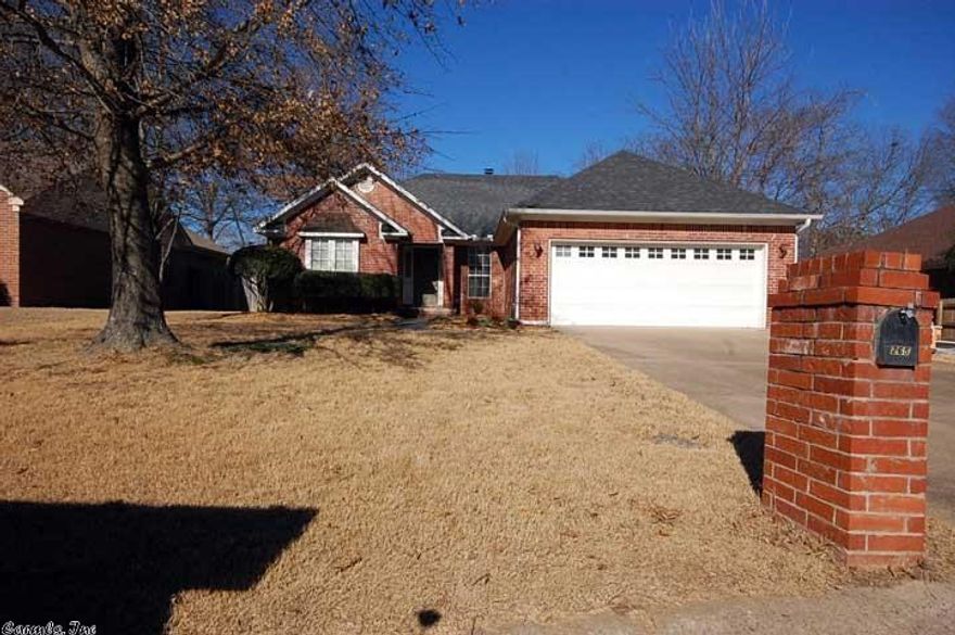 Adorable home within blocks of shopping, schools, restaurants and walking trail.  This home has beautiful hardwoods in living area, great natural lighting, and FRESHLY painted walls, trim and cabinets. Kitchen has updated ceramic tiled counter tops & back splash, NEW stove, NEW microwave and NEW dishwasher. Split floor plan. Large deck with built in bench & extra landscaping out back. Don't miss the addt'l storage closet off deck.This is perfect for a first time home buyer & it's in move in ready condition.