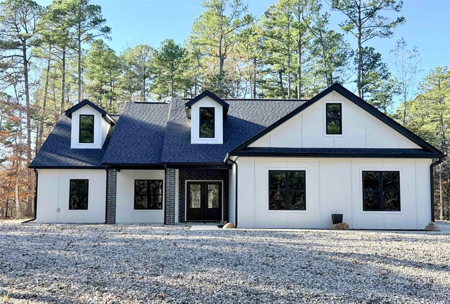 BRAND NEW CONSTRUCTION nestled on a corner lot centrally located for easy access to everything! With 3 bedrooms on the main level and a 4th bonus room upstairs, you'll have the space you need for additional bedroom, office, crafts, or even h/c storage! The Vaulted living room features an open floor plan with spacious bedrooms (9' ceilings) split for privacy and preferred lay-out! Cambria Quartz countertops, Kraftmaid cabinets, and a 4x8 island, prep sink, pop-up receptacles for appliances, and USB charging equips this kitchen for easy living! Don't miss the LED lighted mirrors with anti-fog technology in the bathrooms!  Washer/dryer Combo conveys! Over-sized 3 car garage (approx. 765 sq ft) with Smart technology: auto door openers with built-in cameras for video and 2-way audio through your smart phone app! Exterior is smart siding with black trimmed Quaker windows! Just a 10 minute drive to Lake Balboa Marina, multiple East end golf courses, or Coronado Fitness Center and lake, Multiple trails, restaurants, and more!