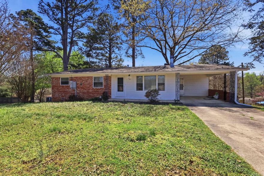 Welcome to the heart of Hot Springs—where space, flexibility, and opportunity come together. This 4-bedroom, 3-bath home offers a versatile layout ideal for growing families, multigenerational living, or income potential. Upstairs features the main living area with three bedrooms and two full baths, including a comfortable primary suite with a private en-suite. The dining room opens to a spacious 13x30 deck—perfect for relaxing or entertaining. Downstairs expands your options with a second living area, fourth bedroom, and full en-suite bath. With its own exterior entrance and interior access, it’s ideal for guests, extended family, or a private rental setup. Enjoy dual living spaces that offer both privacy and adaptability to fit your needs. Conveniently located just minutes from shopping, dining, entertainment, and outdoor recreation, this home blends comfort with convenience. If you’re looking for space, function, and flexibility, this one is a must-see. (Public data has home listed at 1904 sq ft, seller states 2190 sq ft)