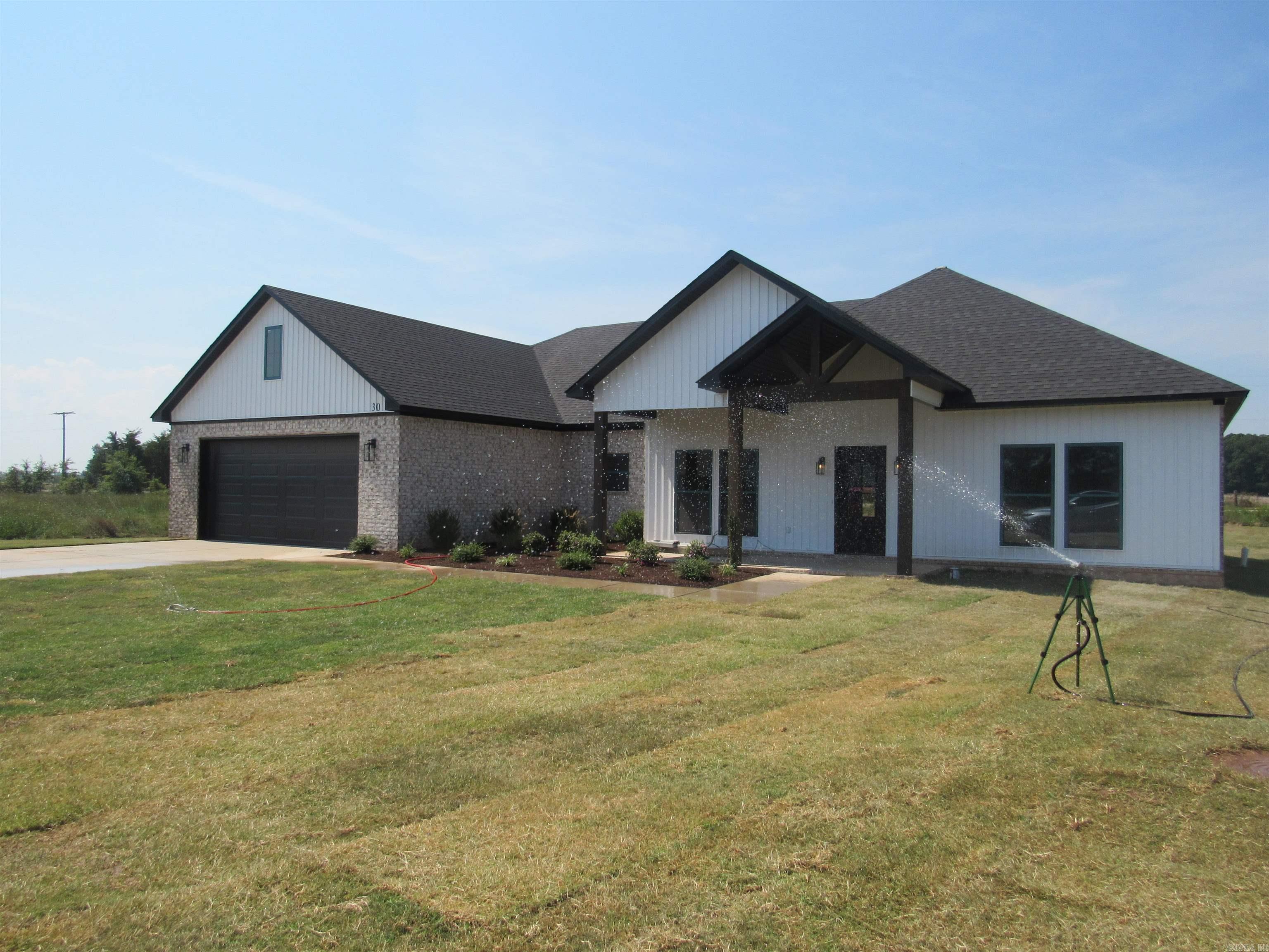 Another new home by Terry Resecker! Completely finished and ready to show. You will find all the quality and workmanship you would expect from a Reli Properties new construction. 9-foot ceilings, quartz counter tops throughout the home, high end LTV flooring and fixtures, spacious butler's pantry, utility room with sink and folding laundry space. entry from the hall into utility room and then walk through to the primary closet. Covered patio on back of home big enough to entertain and relax. Come see this beautiful home. I can help you get in. PROFESSIONAL PHOTOS COMING WEDNESDAY.