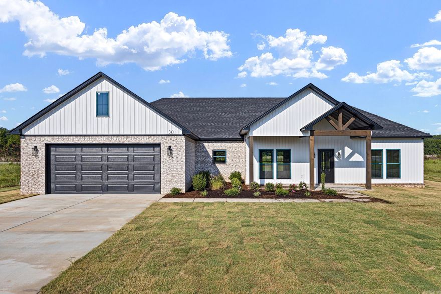 This beautiful new construction home is officially complete and ready for its new owners! You’ll love the thoughtful details throughout—9-foot ceilings, quartz countertops, high-end LVP flooring, and stylish fixtures that give the home a clean, modern feel.  The spacious butler’s pantry and the utility room—with a sink, folding area, and a convenient walk-through to the primary closet—make everyday living easier and more functional.  Out back, the large covered patio is perfect for relaxing or hosting family and friends.  Come take a look—you’re going to fall in love with this one!