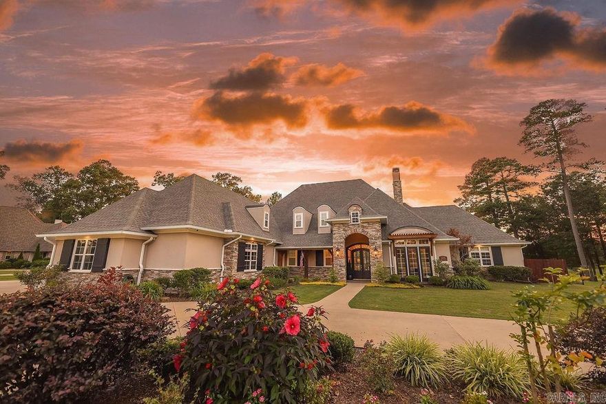 Discover luxury living at its finest in this custom-built home located on the prestigious Mystic Creek Golf Course, rated the number one course in Arkansas by Golf Week. This exquisite 4-bedroom, 4.5-bath residence offers 5,191 sq ft of meticulously designed living space.  **Features:** - **Prime Location:** Overlooking the scenic 12th hole of Mystic Creek Golf Course. - **Spacious Layout:** 3 bedrooms downstairs, each with en-suite baths, 4th bedroom upstairs with full bathroom in hall and an additional half bath for guests. - **Office with Fireplace:** A cozy and functional space for work or relaxation. - **Massive Laundry Room with Craft Area:** Convenience and creativity combined in this expansive utility space. - **Entertainment Paradise:** Custom pool with a covered patio, ideal for hosting gatherings and enjoying outdoor living. - **Home Theater:** Enjoy cinematic experiences in the comfort of your own home.  Embrace a lifestyle of elegance and sophistication in this one-of-a-kind property. Schedule your private tour today!