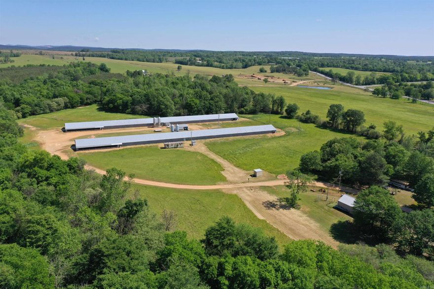 Great investment opportunity! This great farm outside of Murfreesboro includes a 3 bedroom/2 bath main home, large shop with an apartment above it, a 2 bedroom/1 bath rental home, a shop house, 2 broiler houses in operation. Includes 22.93 +/- acres with a pond. Option to buy the chicken houses and shop house separate for $450,000.