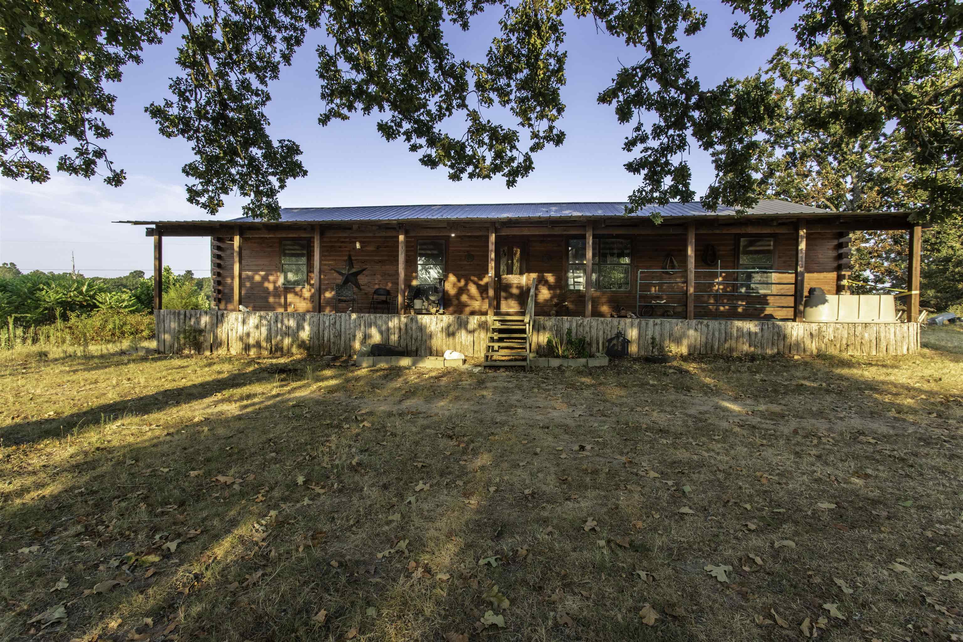Diamond in the Rough ā 27 Acres in the Ozark Foothills Looking for a peaceful homestead, hobby farm, or getaway property? Welcome to 101 Hills Farm Lane in Evening Shade, Arkansasāa log-sided home with endless potential, sitting on 27 beautiful acres in Sharp County. Log-sided 1,800 sq. ft. home with vaulted living room, partially open-concept floor plan, and large front/back porches. Features partial unfinished basement and 26x24 powered shop building. Property includes 27 acres fenced and cross-fenced, mix of pasture and woods, plus 2 ponds (one spring-fed). Well water on site. Ideal for hobby farm, livestock, or country retreat. HVAC currently not operational. Water is turned off but well is functional. Bedroom floors in disrepair. Toilet is missing in master bath. Highlights: 1,800 sq. ft. home, log siding 26x24 shop with power Partial unfinished basement 27 acres ā pasture & woods 2 ponds (spring-fed & stocked potential) Fenced & cross-fenced Well water Great opportunity to own land in the Ozark foothills of Sharp County.