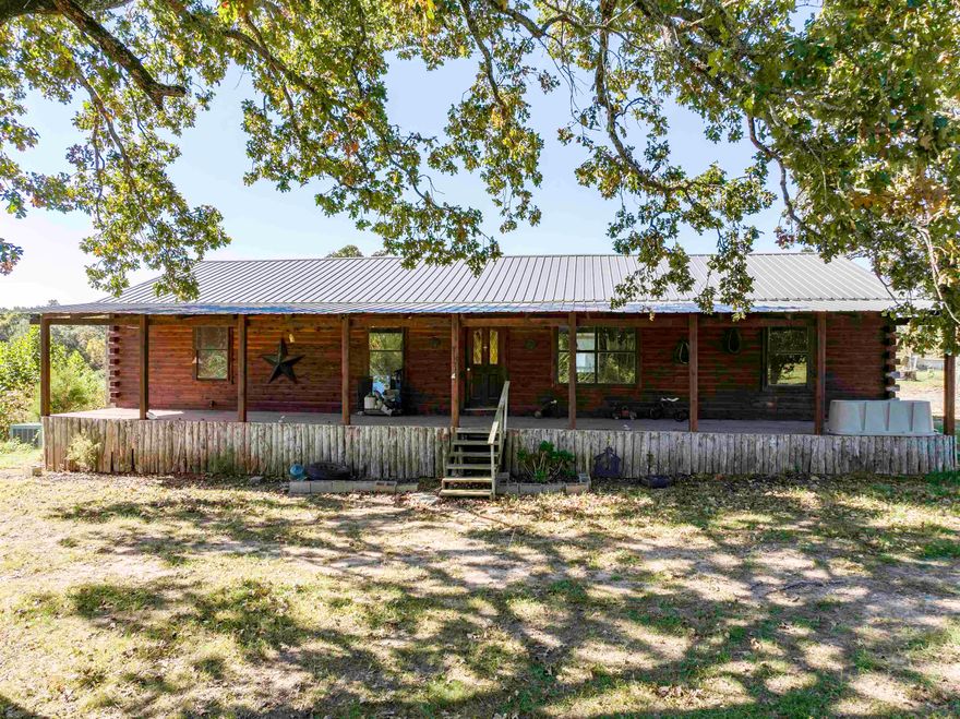 Diamond in the Rough – 27 Acres in the Ozark Foothills   Looking for a peaceful homestead, hobby farm, or getaway property? Welcome to 101 Hills Farm Lane in Evening Shade, Arkansas—a log-sided home with endless potential, sitting on 27 beautiful acres in Sharp County.  Log-sided 1,800 sq. ft. home with vaulted living room, partially open-concept floor plan, and large front/back porches. Features partial unfinished basement and 26x24 powered shop building. Property includes 27 acres fenced and cross-fenced, mix of pasture and woods, plus 2 ponds (one spring-fed). Well water on site. Ideal for hobby farm, livestock, or country retreat. HVAC may need work. Water is turned off but well is functional. Bedroom floor in disrepair. Toilet is missing in master bath.   Highlights: 1,800 sq. ft. home, log siding 26x24 shop with power Partial unfinished basement 27 acres – pasture & woods 2 ponds (spring-fed & stocked potential) Fenced & cross-fenced Well water Great opportunity to own land in the Ozark foothills of Sharp County.