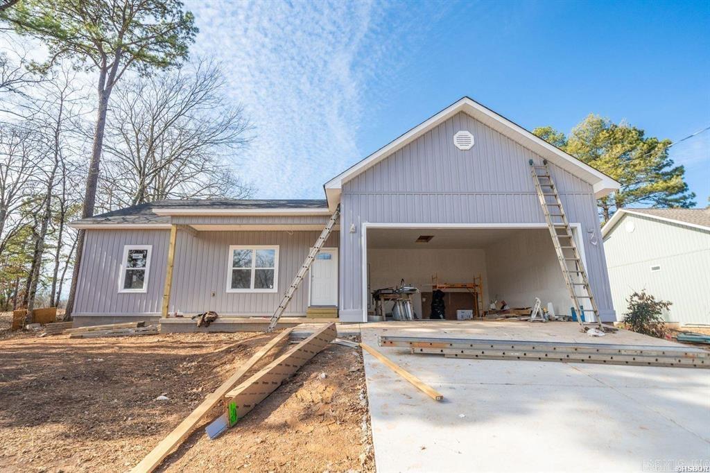 Welcome to this stunning new construction home, offering 3 spacious bedrooms and 2 beautifully designed bathrooms within 1,600 square feet of open living space. Located in the highly sought-after Lake Hamilton School District! The open floor plan enhances the sense of space, providing a seamless flow from room to room, ideal for both entertaining and everyday living. Don't miss out on the opportunity to own this incredible home! Schedule your private tour today. Listing Agent/Related to Seller.