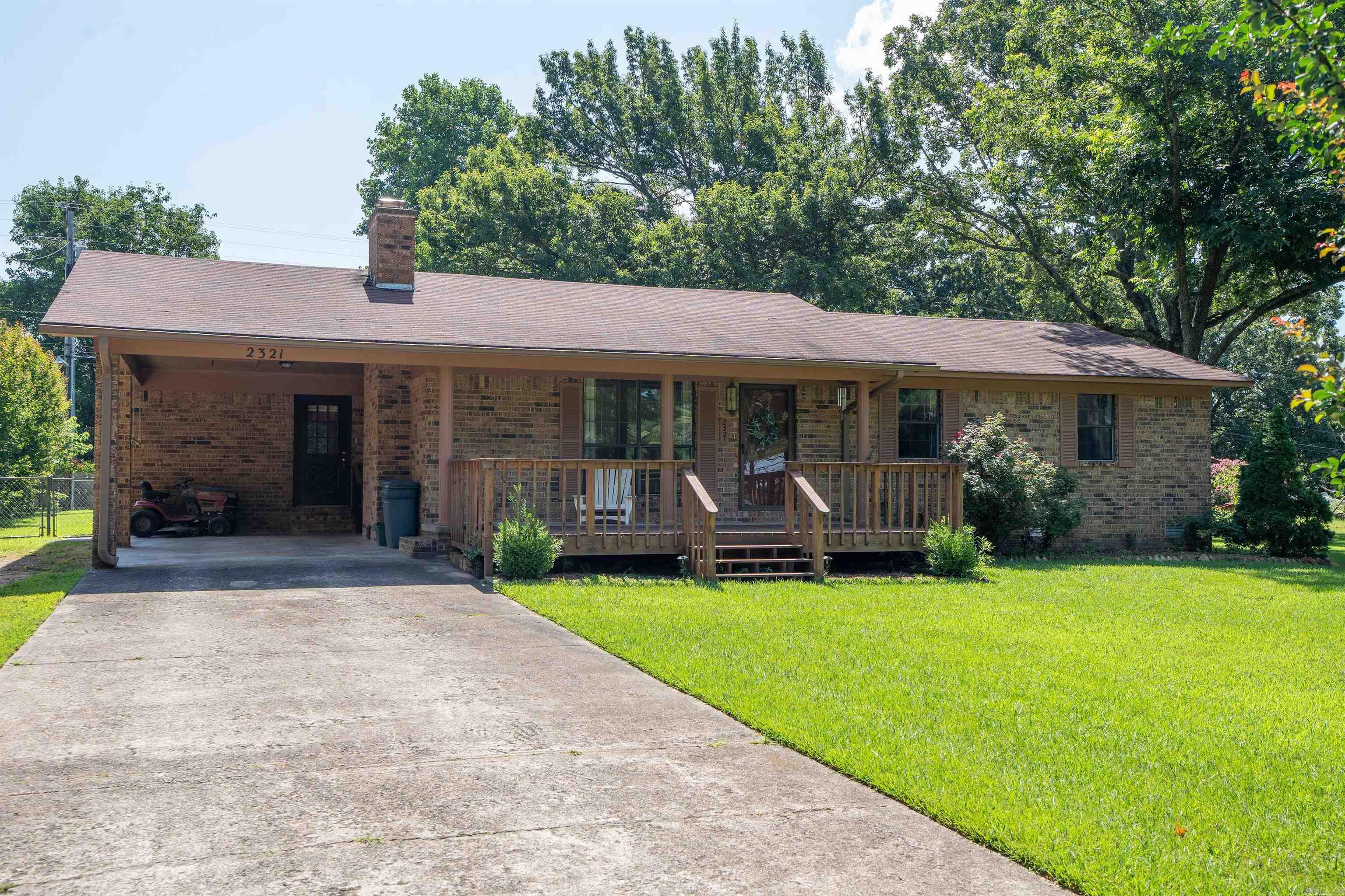 Recently updated 3 Br, 2 BA 1395 sf Brick Ranch is located close to Greers Ferry Lake boat launch and Thunderbird Country Club.with its golf course, club house, and pool. New front porch welcomes you into this much loved home. New screened in porch overlooks the fenced back yard, providing privacy and is perfect for kids, pets, and garden enthusiasts. 12x16 shop, and a 8x10 storage building are a bonus Floor coverings were replaced in 2019 and kitchen remodeled....granite countertops, subway back splash ,new sink, new stainless steel appliances including a much desired natural gas range and refrigerator w/ ice maker.. New tub/shower in hall bath and walk in shower in Primary Bath. Cozy wood burning fireplace in Gt Rm and laundry/mud room off carport entrance make living here more desirable. Contact your Real Estate Agent to see this home.