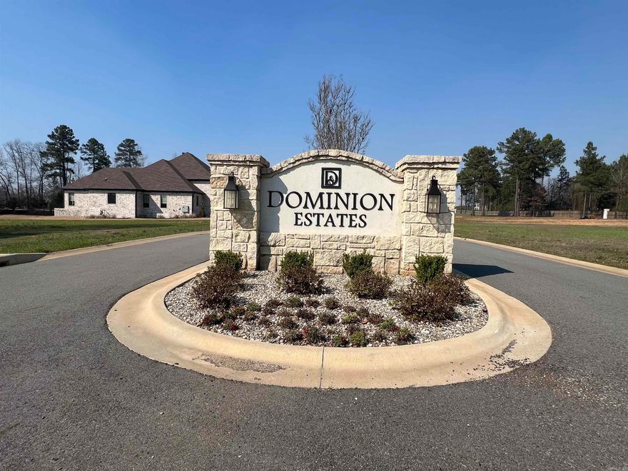 Welcome to this beautiful, cleared lot in Dominion Estates, ideally located on a quiet cut-de-sac across from the Searcy Country Club. This curb-lined street offers a prime setting to build a custom home in one of Searcy's most desirable areas.