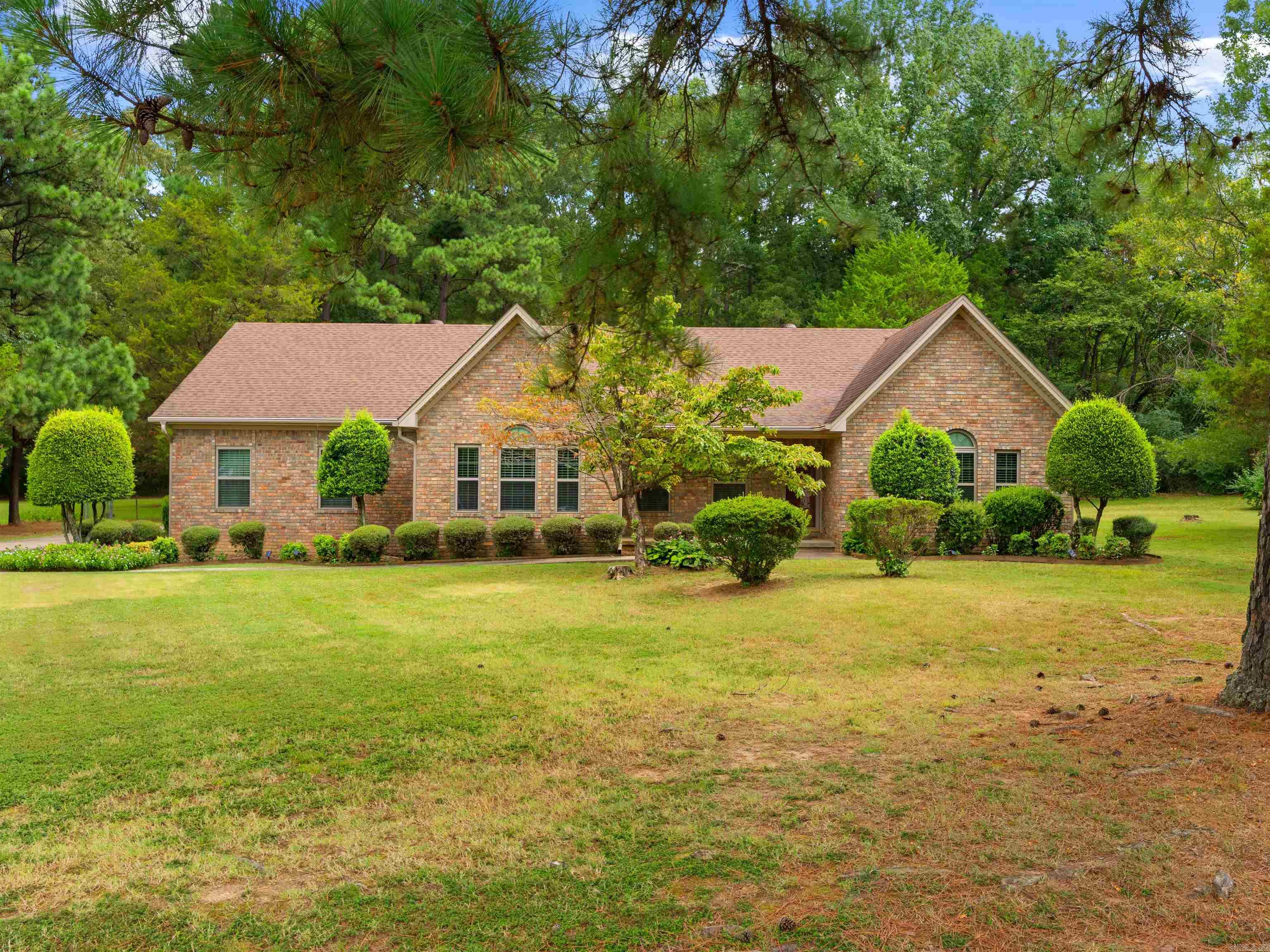 Beautiful and immaculate well appointed, all brick, 3 bedrooms (possible 4th or study), 3 bath, home located on 1 acre at the end of street which offers privacy and convenience to local amenities- school, shopping and I-57. Home features include hardwood flooring, new windows and window blind treatment (2022), Architectural roof (2016), updated paint, carpet in (2) bedrooms, 6" insulated exterior walls, 3 car oversize garage, 2537 sq ft of living area, leaf guard gutters, two hot water tanks (50 & 40) gallons. and upgraded appliances in a remodeled eat-in kitchen. Lots of storage space. Bedroom closets have chest for additional storage/organization. French doors open into the backyard with a patio for outside living. This home will not disappoint.