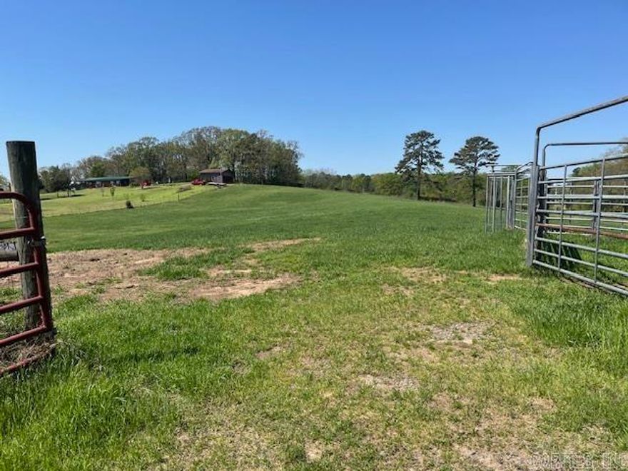 NICE 5 ACRES IN HARRIS FARM ESTATES,CORNER LOT, CITY WATER, HAS SMALL POND. SEE SHOWING REMARKS