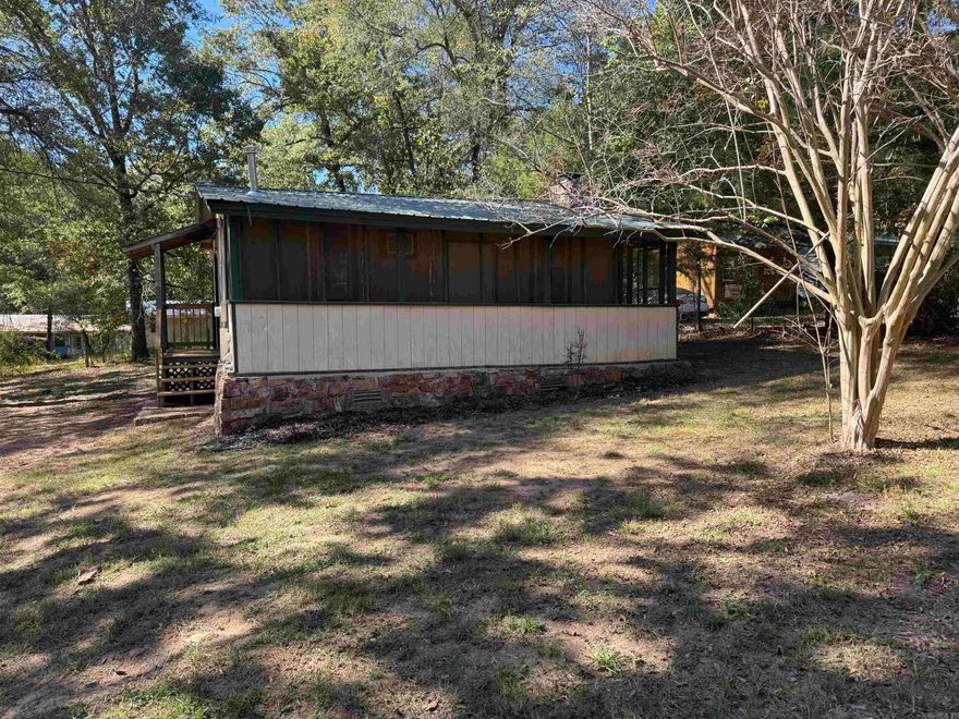 Hunters and fishermen here is your get-away cabin near Lake Nimrod in Yell County Arkansas. There are 2 bedrooms and 1 bath, a nice living, dining, and kitchen area, an enclosed front porch with a place for washer. New carpet, new interior paint, and a fireplace in the living area. There are 3 access areas for Lake Nimrod, close to Ouachita National forest, and a large public duck hunting area.