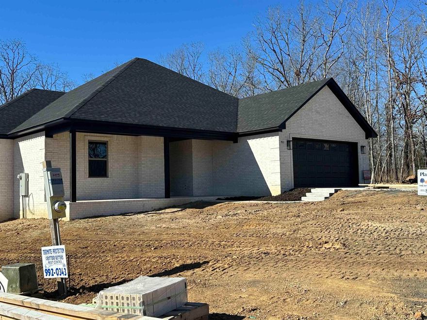 Amazing custom built home on large private lot with view of Penn pointe lake .Open and airy floor plan designed for everyday living and entertaining.Open kitchen and breakfast bar that overlooks super large den with soaring vaulted ceiling for a spacious feeling .Stainless steel appliances and granite countertops custom backsplash. Luxurious master bedroom with large soaking tub separate shower ,super large closet luxury vinyl thru out house nice laundry room with storage in thur garage by laundry room.Long time on site builder that offer a ten year structural warranty.