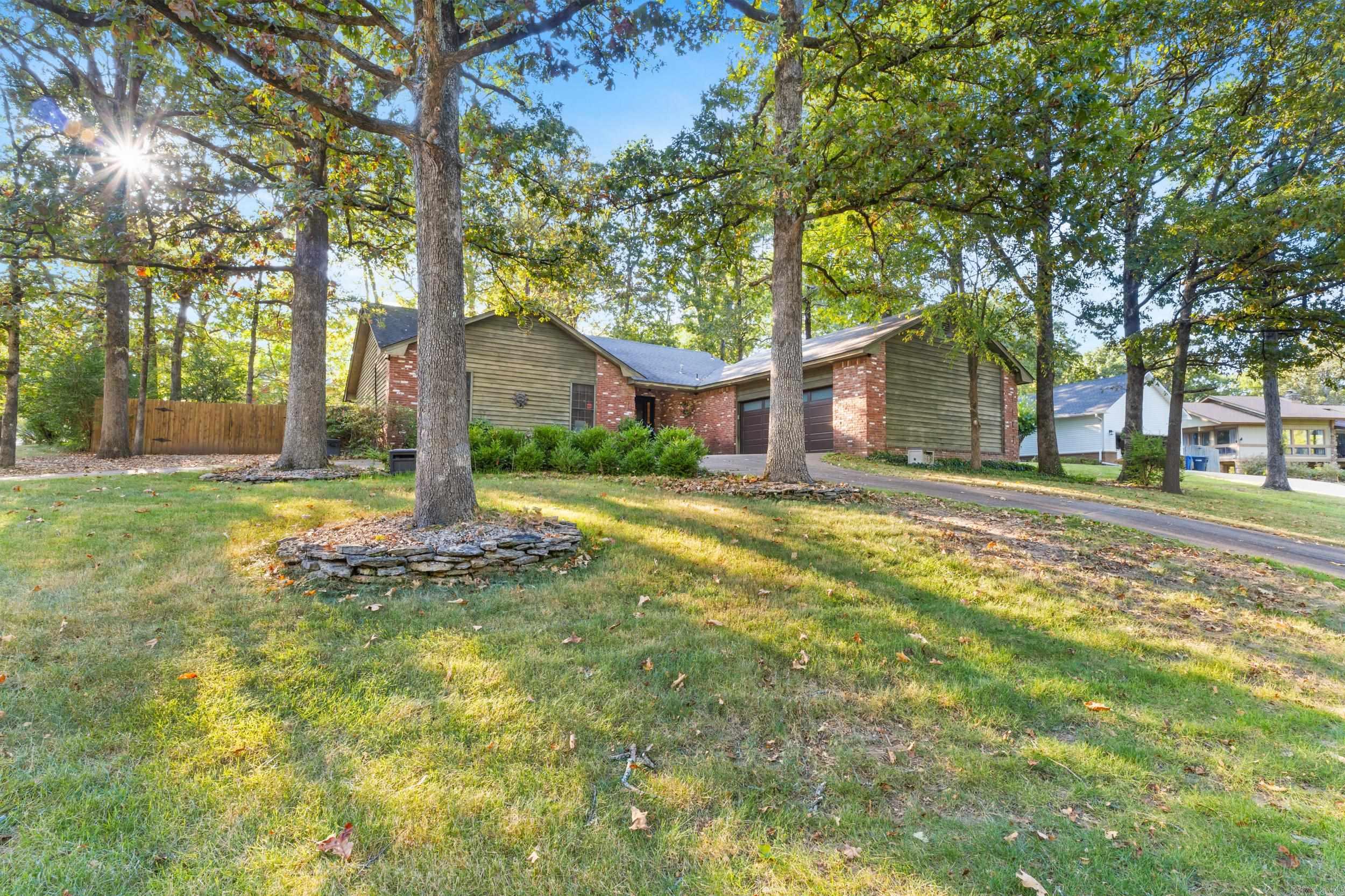 Welcome to this well maintained single-owner home. Thoughtfully updated for modern living. Featuring a fully updated kitchen, bathrooms and beautiful granite countertops. With three generous bedrooms and two renovated bathrooms, this property offers large rooms and abundant storage throughout. The primary bedroom includes two spacious closets, one a walk-in, and an ensuite bath with a walk-in shower. Enjoy the versatile screened-in porch overlooking the private courtyard. The circle drive leads to an oversized garage with an attached shop, providing ample space for vehicles, hobbies, or storage. For even more flexibility, a detached shop building sits in the backyard. A pre-market inspection has been completed, so you can move in with confidence. Located within the highly sought-after Valley View School district. In addition to a new roof soon, the seller will provide a 14-month home warranty to ensure peace of mind for the new owner.