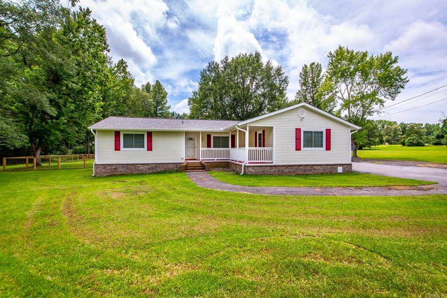Updated Home with Shop and Acerage. Come Tour this beautiful Home with Brand new updates. Home features a new large exterior Shop. Large fenced Back yard! the home boast a Secondary living room with large windows with access to an outdoor patio perfect for Entertaining. Inside the home you'll find new paint through out. An Eat in Kitchen with new Counter tops and Backsplash. Both bathrooms have been renovated. Wrap Around Front porch! Shop built in 2024. Crawl Space was encapsulated in 2021, Roof was replaced in 2022. This home is a must see!