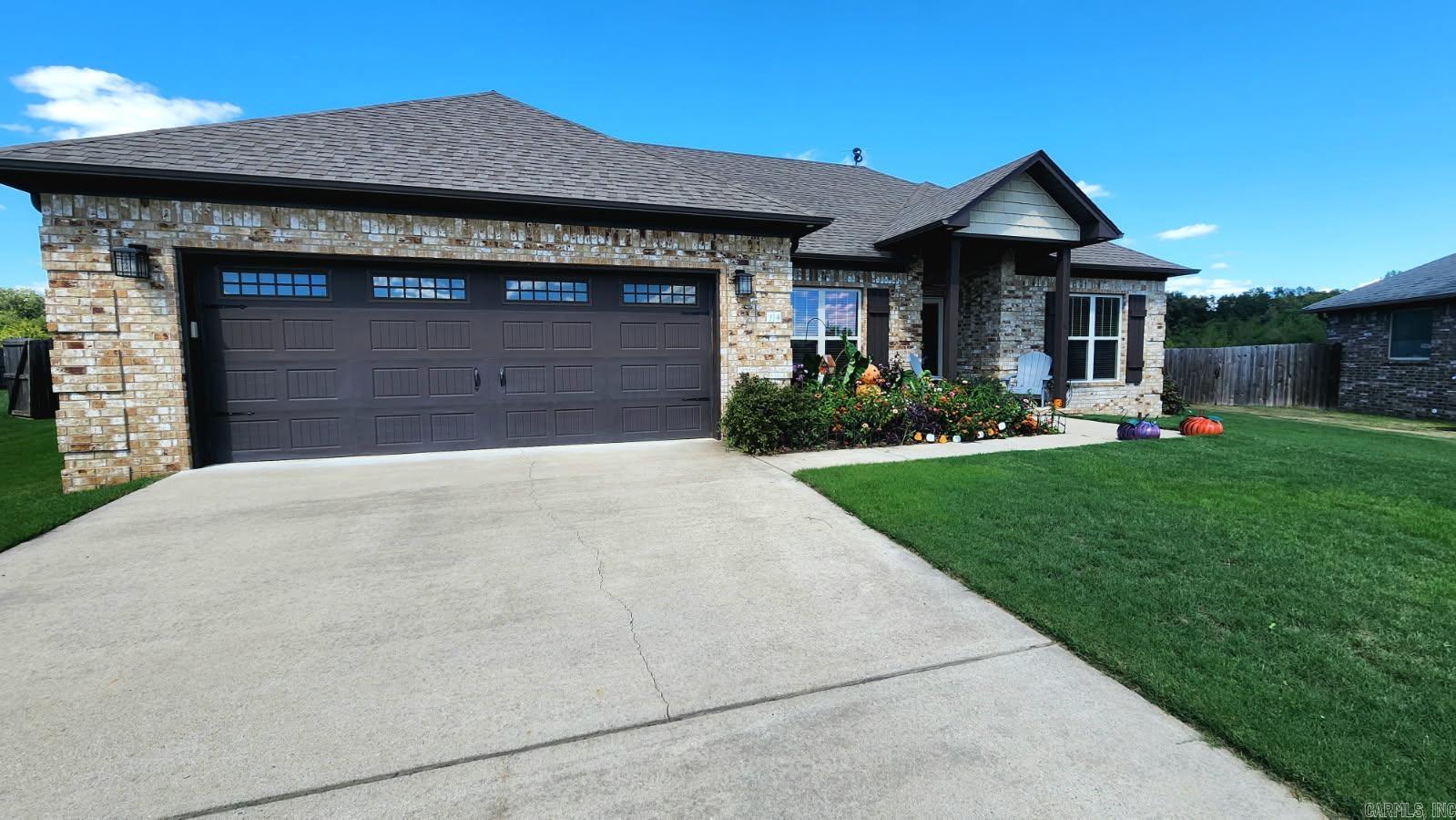 Charming split floor plan home in Jewels Estates. This home features 3 bedroom and 2 bath with 1836 sqft. From painted ceilings to the large covered back porch, this home has it all! You can enjoy solid hardwood floors an open kitchen and great room, walk-in pantry, formal dining room.