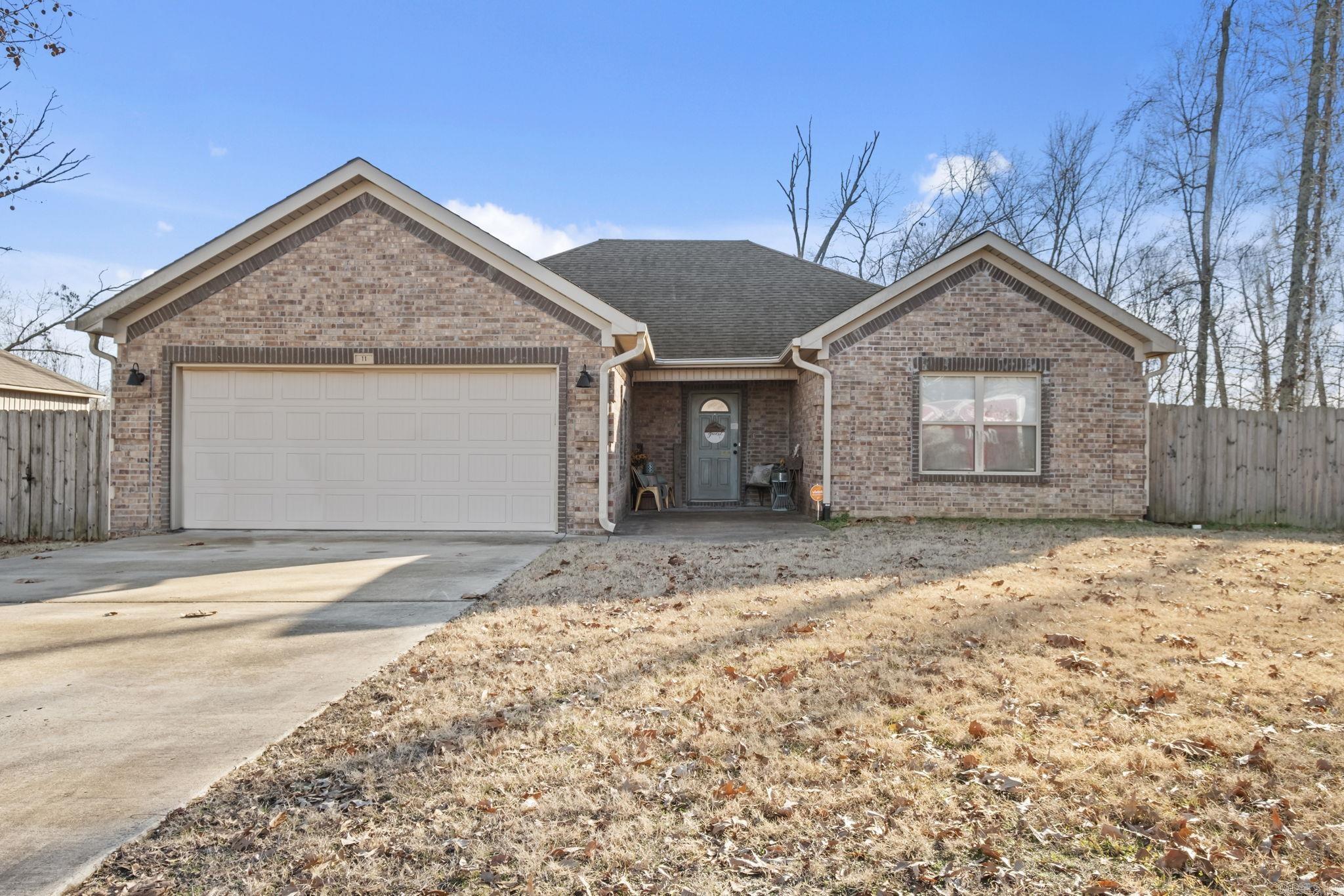 This home is an absolute doll house!! It is located on a wonderful corner lot with a fully fenced backyard! The split bedroom floor plan offers the privacy you need and 4 bedrooms! The open kitchen and dining room allow you to cook up that fabulous meal and visit with your family or guest at the same time! The primary suite is complete with a jetted tub and spacious bathroom! The tile floors look like wood and are so pretty! The wood beam in the den is a favorite! See Agent Remarks.