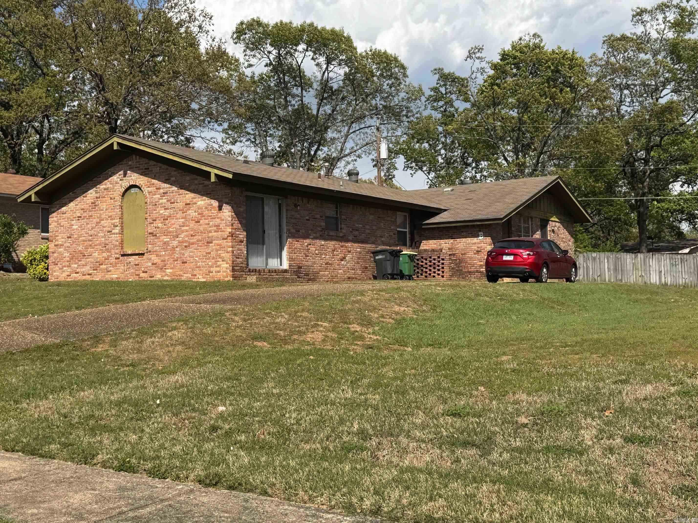 All units occupied. NO showings until under contract. No walking around, residents are not aware. Property is available to purchase with adjacent duplexes and triplexes also listed in CARMLS, which include 9000 Woodbine, 9001 Woodbine, 9007 Woodbine, 103 N Woodview, 105 Lantrip. Listing price for all six properties (14 units total) is $1,260,000.