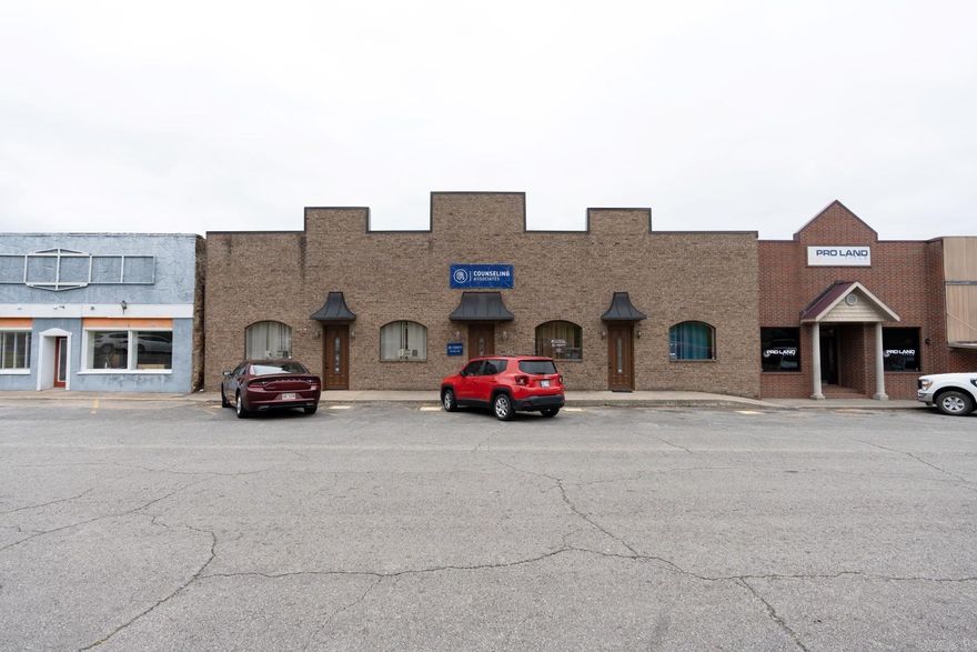 Large commercial building on the courthouse square in Heber Springs!  2 of the 4 areas in the building are rented.  The two rented areas leased for $700.00 and $650.00 each per month, and are one-year contracts that will expire in about January of 2026.  Tile floors, tall ceilings, 6 restrooms, storage areas, several private office, large meeting rooms, reception area, private parking in the rear of the building and lots of community parking around the courthouse!  A long hallway goes thru the middle of the building...the layout can accommodate 1 tenant or up to 4 different tenants!  Seller installed a new roof (about $50,000) in the Summer of 2018.