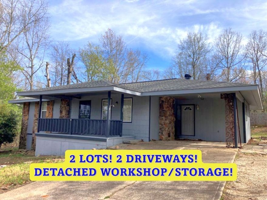 HOME on 2 LOTS w/approx 18'x24' detached WORKSHOP/STORAGE and 2nd driveway! 2 Bedroom, 1.5 Bath home. This home has a big open floor plan with vaulted ceilings, new ceiling fan w/lights & native stone fireplace with gas hookup. Large Mudroom off the carport is perfect for extra space for a freezer and shelves for a pantry. Newer countertops and Gas Cookstove freshen up the kitchen. Nice large, tiled shower with seat in the hall bathroom and 2 good size bedrooms. All of the windows have been replaced with vinyl double pain windows. New 200-amp breaker box was installed 2 years ago to bring the electrical in the house up to today's needs. Approx 17'x8' Covered front porch and big back deck (approx. 15'3"x12'3") for family BBQs. The deck even has a propane hookup for your gas grill or you could use it for your patio heater! The second lot has had an additional driveway that goes to the side street for easy access to the detached shop/storage building and to better access the main road. Listing #2426.