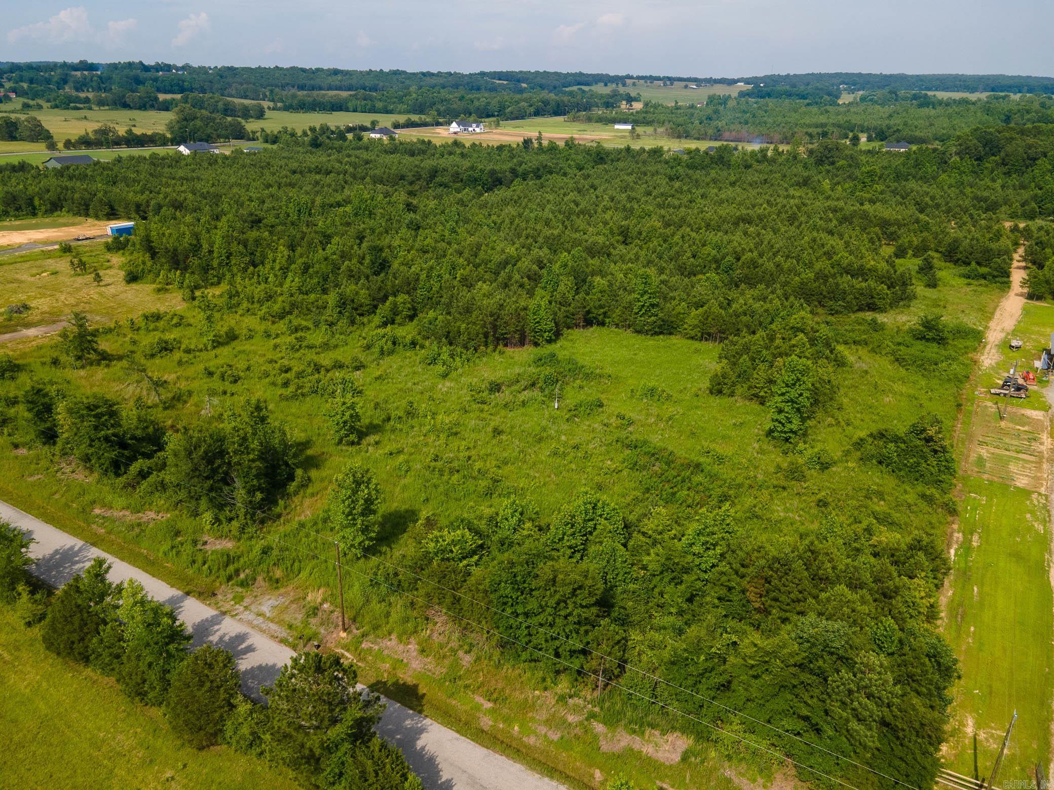 5.1 Acres ā Prime Land Opportunity in Beebe, Arkansas Welcome to your next investment or dream home site in one of Beebeās most desirable and well-established neighborhoods. This 5.1-acre flat parcel offers the perfect blend of privacy, potential, and peaceful surroundings. Located on Brock Road, this land is surrounded by well-maintained properties and pride of ownership, making it a rare opportunity for buyers seeking space without sacrificing convenience. With utilities already run to the property (water & electric) and a culvert installed for driveway access, you're one step closer to breaking ground. Whether you're a developer, a builder looking for your next custom spec project, or a homeowner ready to design your forever home, this property checks every box. There are no steep slopes or costly grading needsājust clean, usable land with beautiful surroundings and wide-open skies.