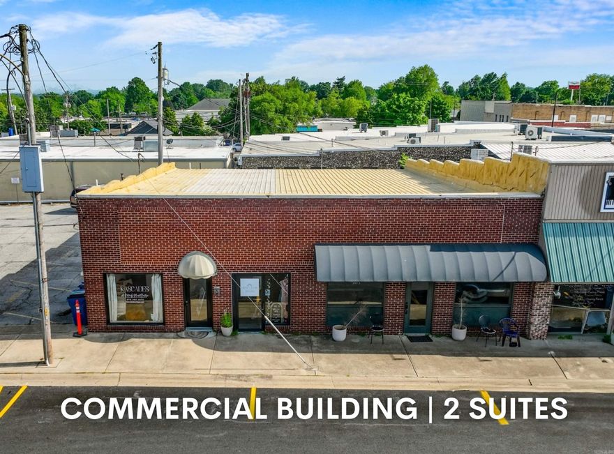 Prime investment opportunity in the heart of Mountain Home’s Baker District—just steps from the downtown square. This 3,120 sq ft commercial building is split into two 1,560 sq ft units. One side is occupied by a long-standing salon with the tenant willing to lease back, providing immediate cash flow. The adjoining unit is a blank slate, ready for renovation or expansion. Combine both sides for a single large footprint or continue dual occupancy. Surrounded by thriving local businesses—including a high-traffic piano bar next door—this location benefits from excellent visibility and foot traffic. Street parking adds convenience. With income in place and serious upside potential, this is a smart addition to any investment portfolio.