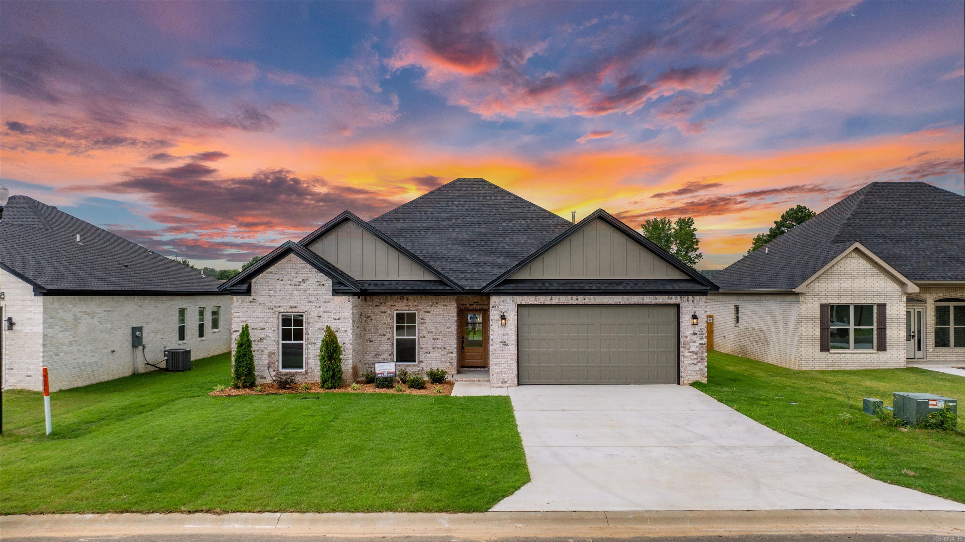 A Rare Find in East Meadows by Greeson Construction—this stunning new build is anything but ordinary. From the moment you step through the door, you’ll notice intentional design choices that elevate every inch of this home. Soaring ceilings, abundant natural light, and an open layout create a warm, welcoming atmosphere that feels both modern and timeless. The primary suite is a true retreat featuring a beautiful walk-in shower, elegant soaking tub, dual vanities, and a sprawling custom closet with built-ins for days. The kitchen stuns with sleek quartz countertops, stainless steel appliances, and custom cabinetry—all complemented by a tankless gas water heater for added efficiency. Guest rooms are generously sized and share a beautifully appointed bathroom with tiled shower/tub and modern vanity. Every detail has been curated to impress. This home doesn’t just meet expectations—it exceeds them. Come experience the craftsmanship. You won’t want to leave.