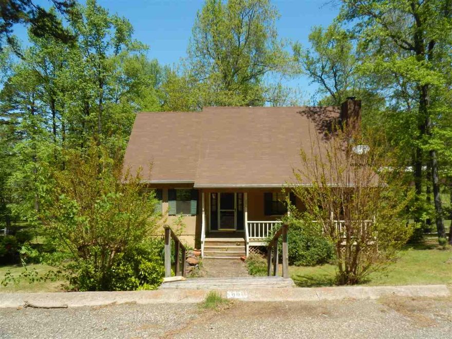 Large lot with a side loading garage. Master is on the main level. Needs some work.  Property to be sold "AS IS" See agent remarks.