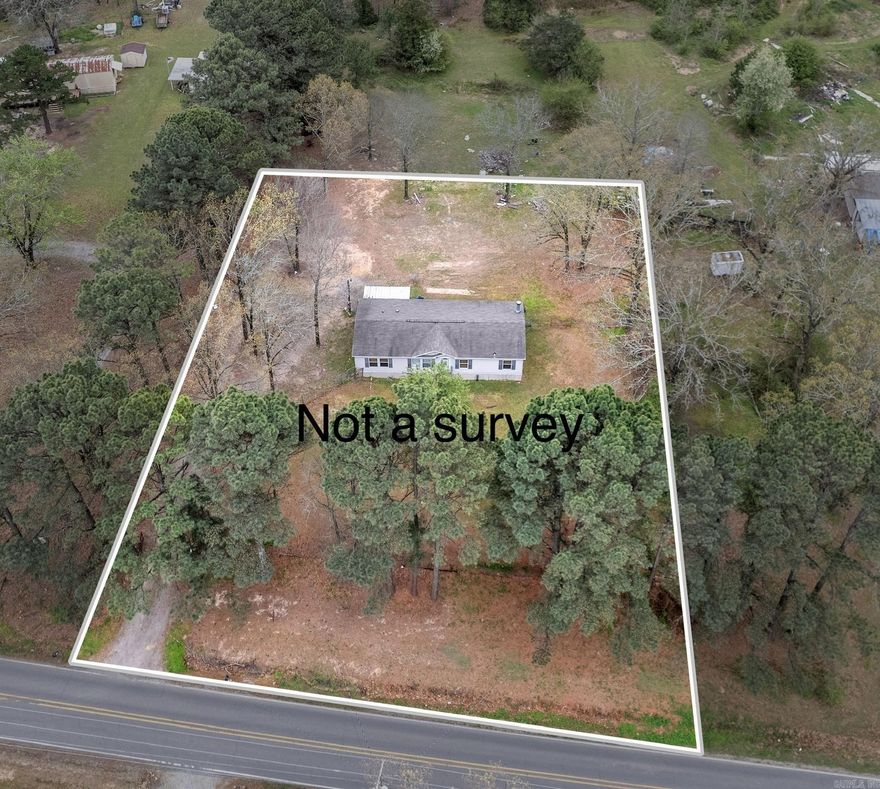 This manufactured home is a 28x56 Clayton built in 2009 on approx. one (1) acre being sold AS-IS.  The home sits on concrete footings has two living areas, three bedrooms, and two bathrooms.